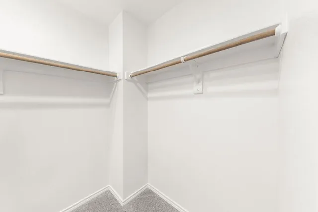 a view of an empty walk in closet