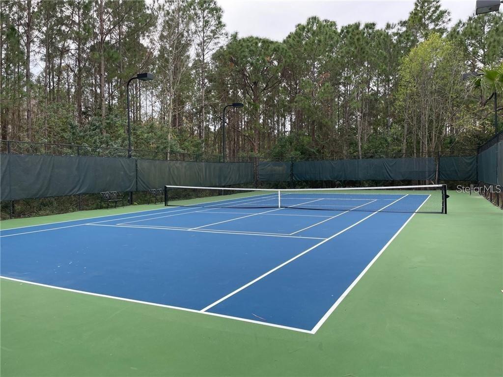 3611 Conroy Road, Unit 825 Orlando, FL 32839 - Photo 21 of 27 a view of a tennis court