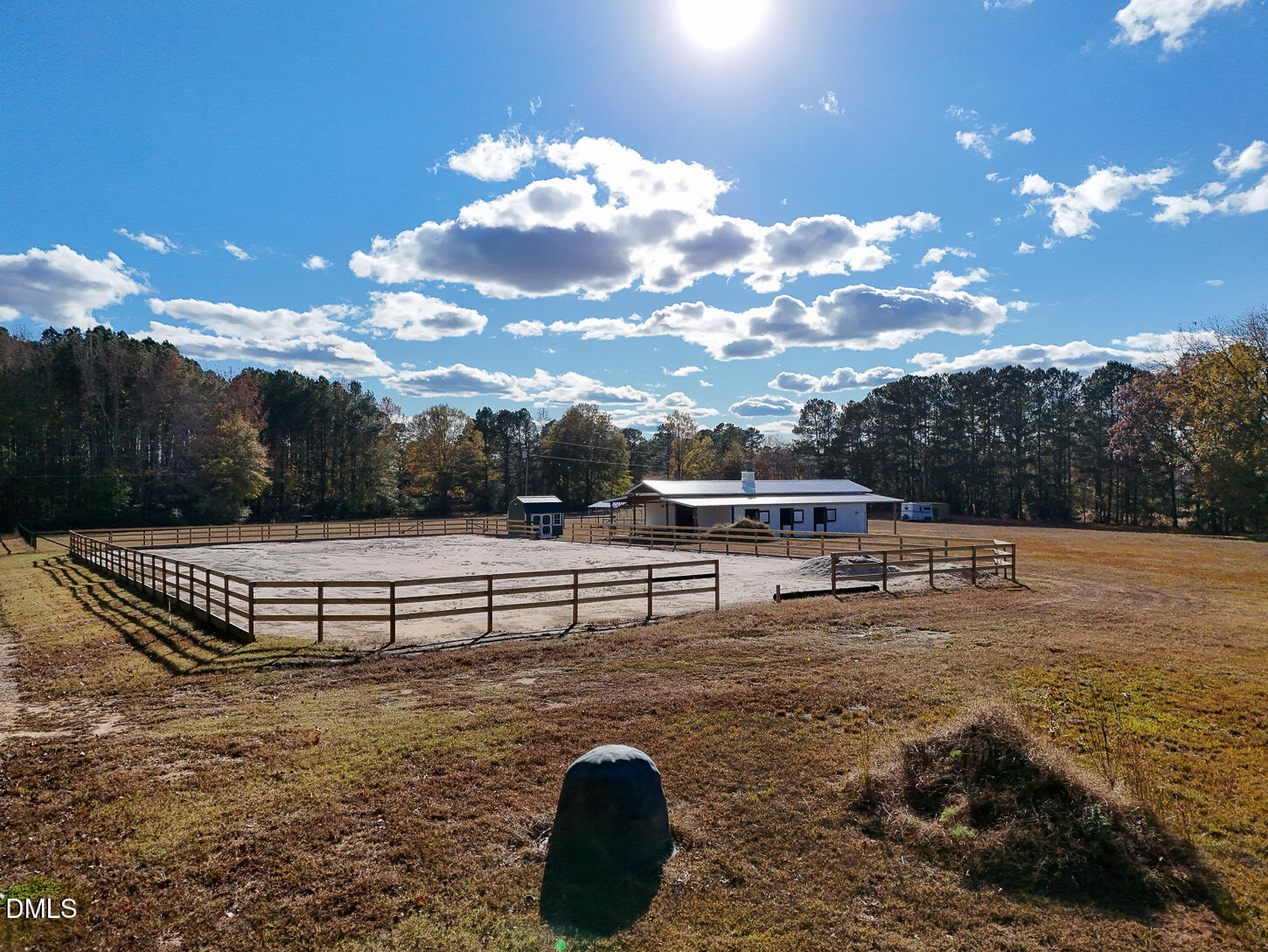 9637 Earpsboro Chamblee Road Zebulon, NC 27597 - Photo 9 of 42 a view of a terrace with a yard