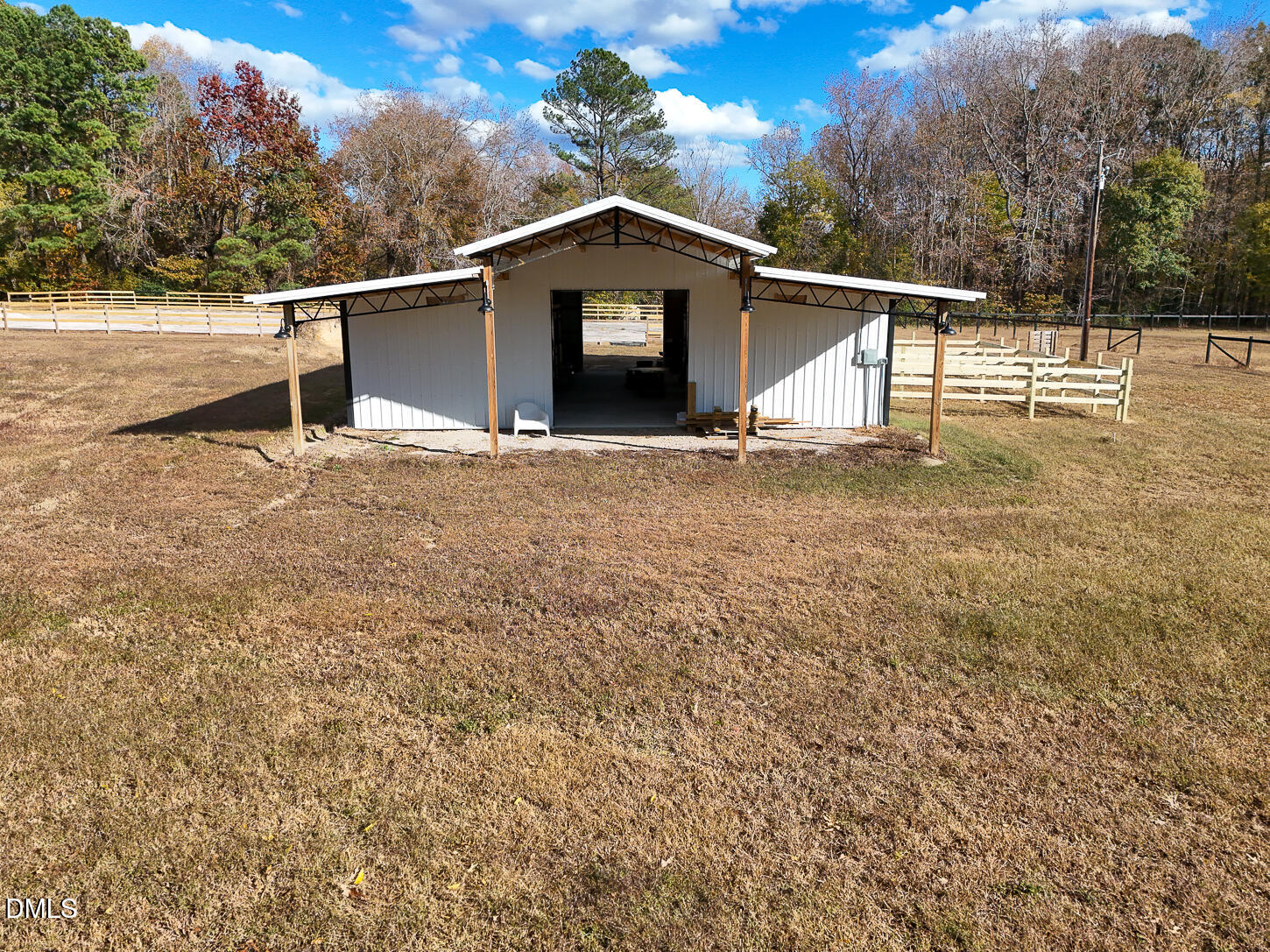 9637 Earpsboro Chamblee Road Zebulon, NC 27597 - Photo 16 of 42 a front view of a house with a yard