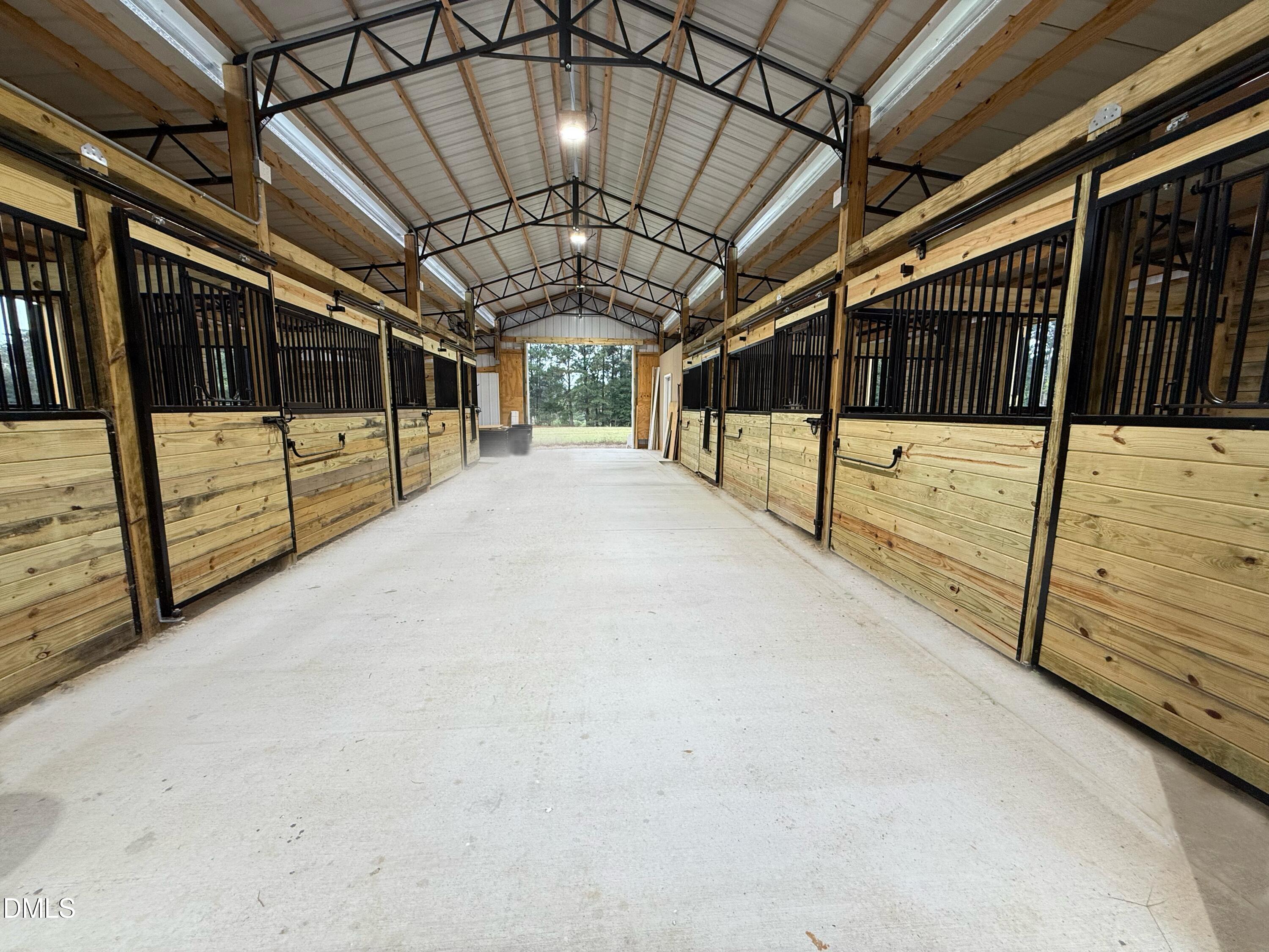 9637 Earpsboro Chamblee Road Zebulon, NC 27597 - Photo 17 of 42 a view of a porch