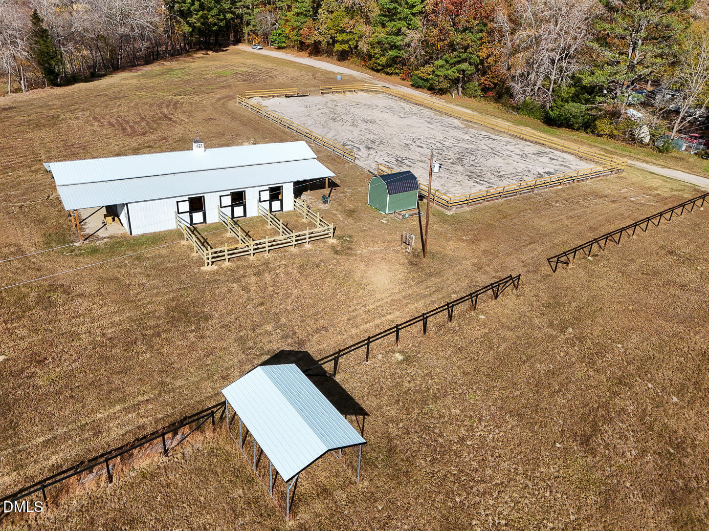 9637 Earpsboro Chamblee Road Zebulon, NC 27597 - Photo 25 of 42 a view of a balcony with two chairs