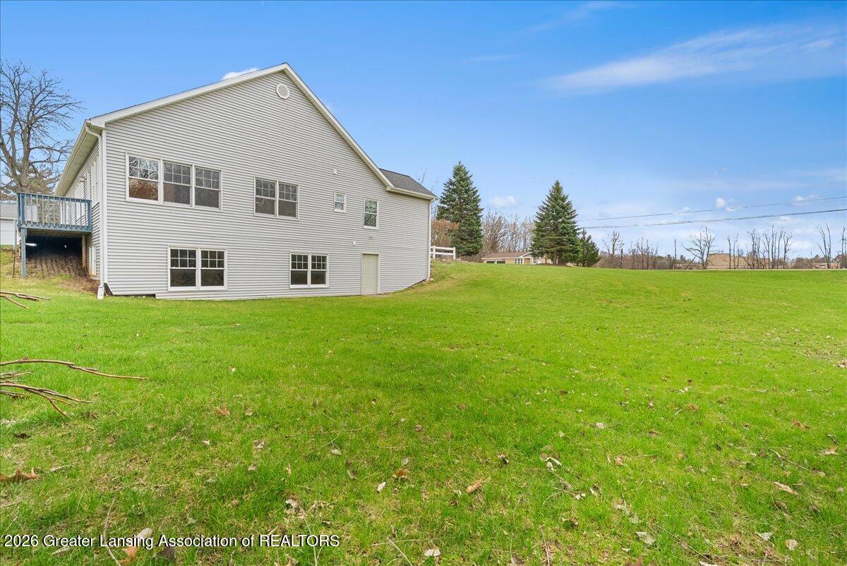 5859 Sleight Road Bath, MI 48808 - Photo 46 of 72 Side of the House
