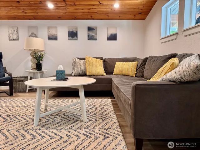a living room with furniture and a couch