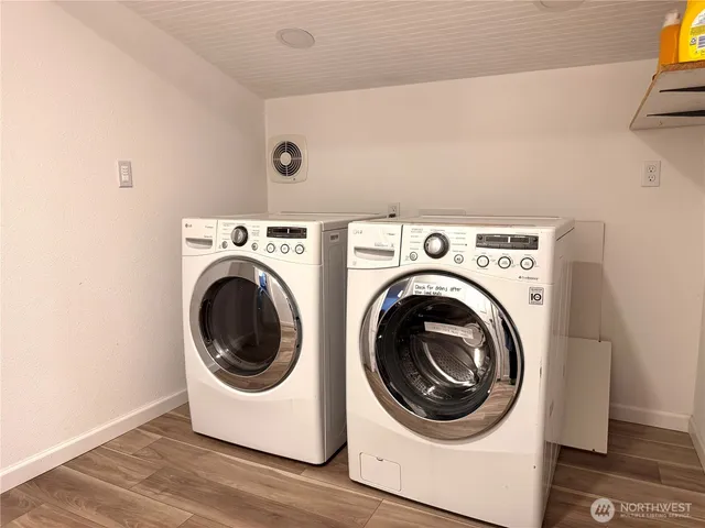 a utility room with dryer and washer