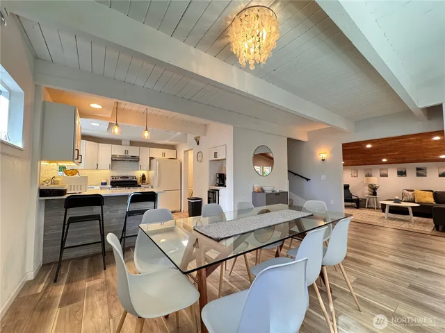 a view of a dining room with furniture