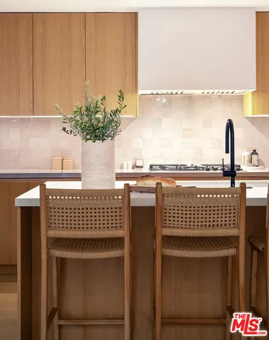 a close up of a sink and a mirror