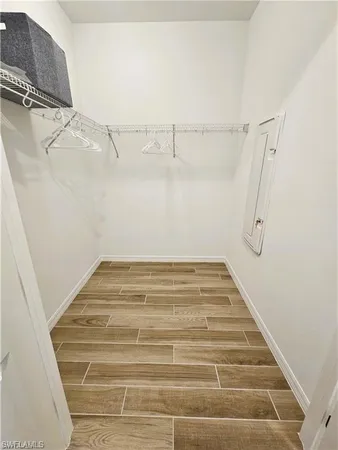 a view of a room with racks on the wall