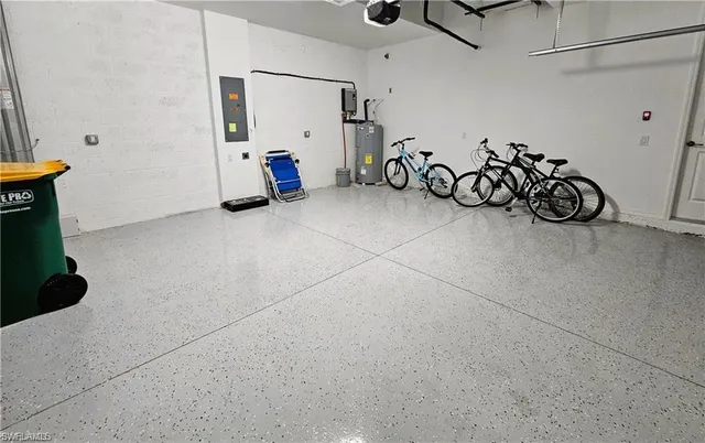 a view of a room with lots of white furniture