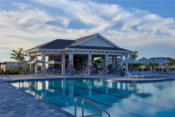 a view of a cafe with sitting area