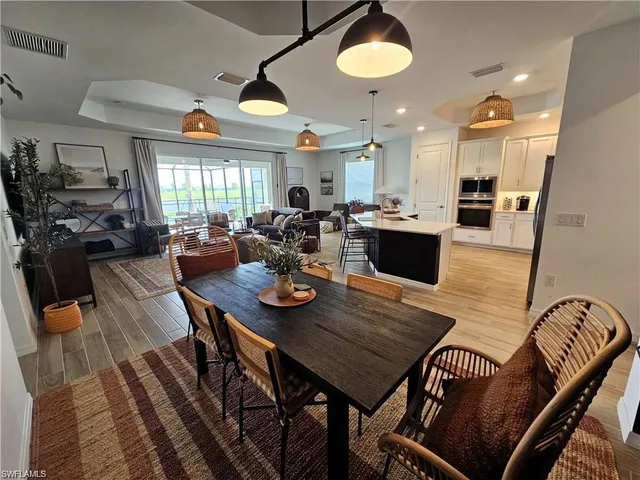 a view of a dining room with furniture