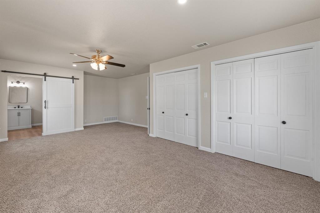 401 Edgewood Lane Cleburne, TX 76031 - Photo 13 of 39 a view of an empty room