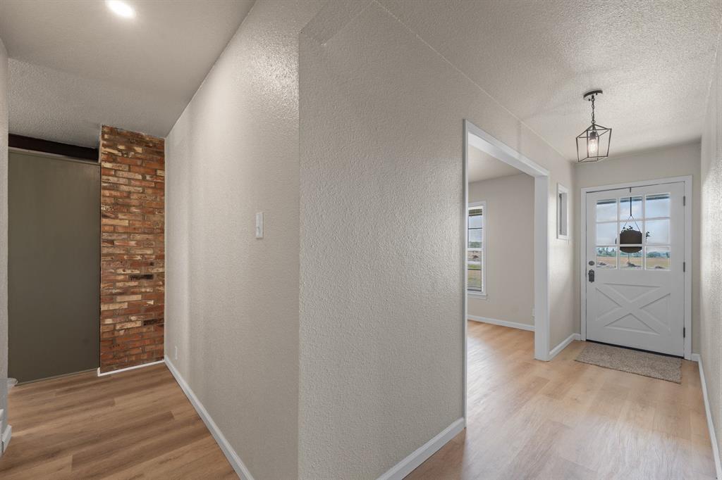 401 Edgewood Lane Cleburne, TX 76031 - Photo 8 of 39 a view of livingroom with hardwood