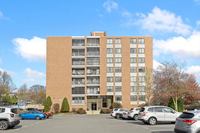 a view of a cars parked in front of a building