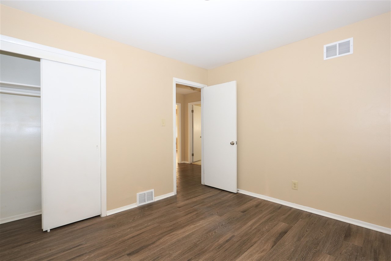 786 North Mendenhall Road Memphis, TN 38122 - Photo 12 of 14 a view of an empty room with wooden floor
