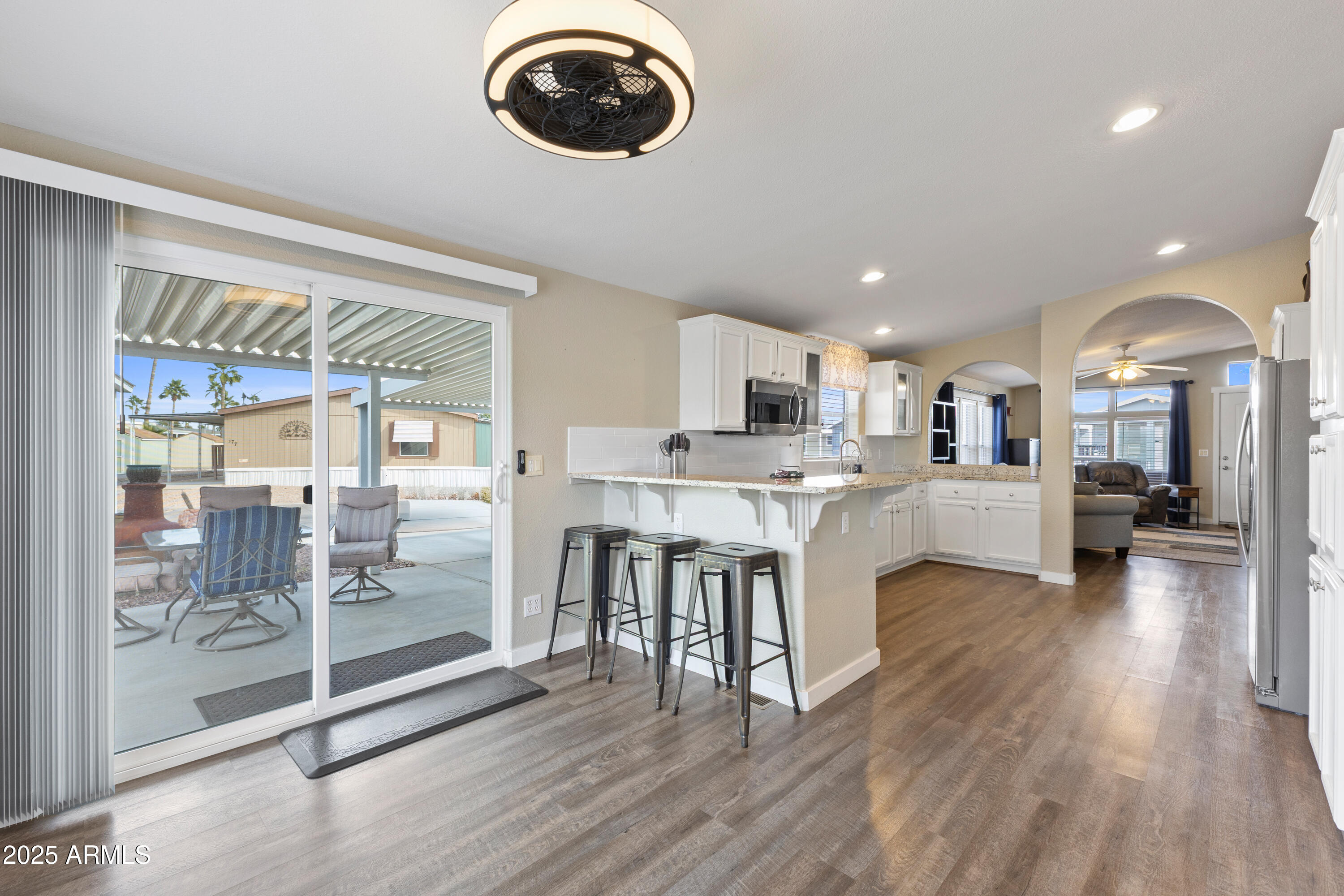 2000 South Apache Road, Unit 156 Buckeye, AZ 85326 - Photo 15 of 40 a view of a kitchen and dining room