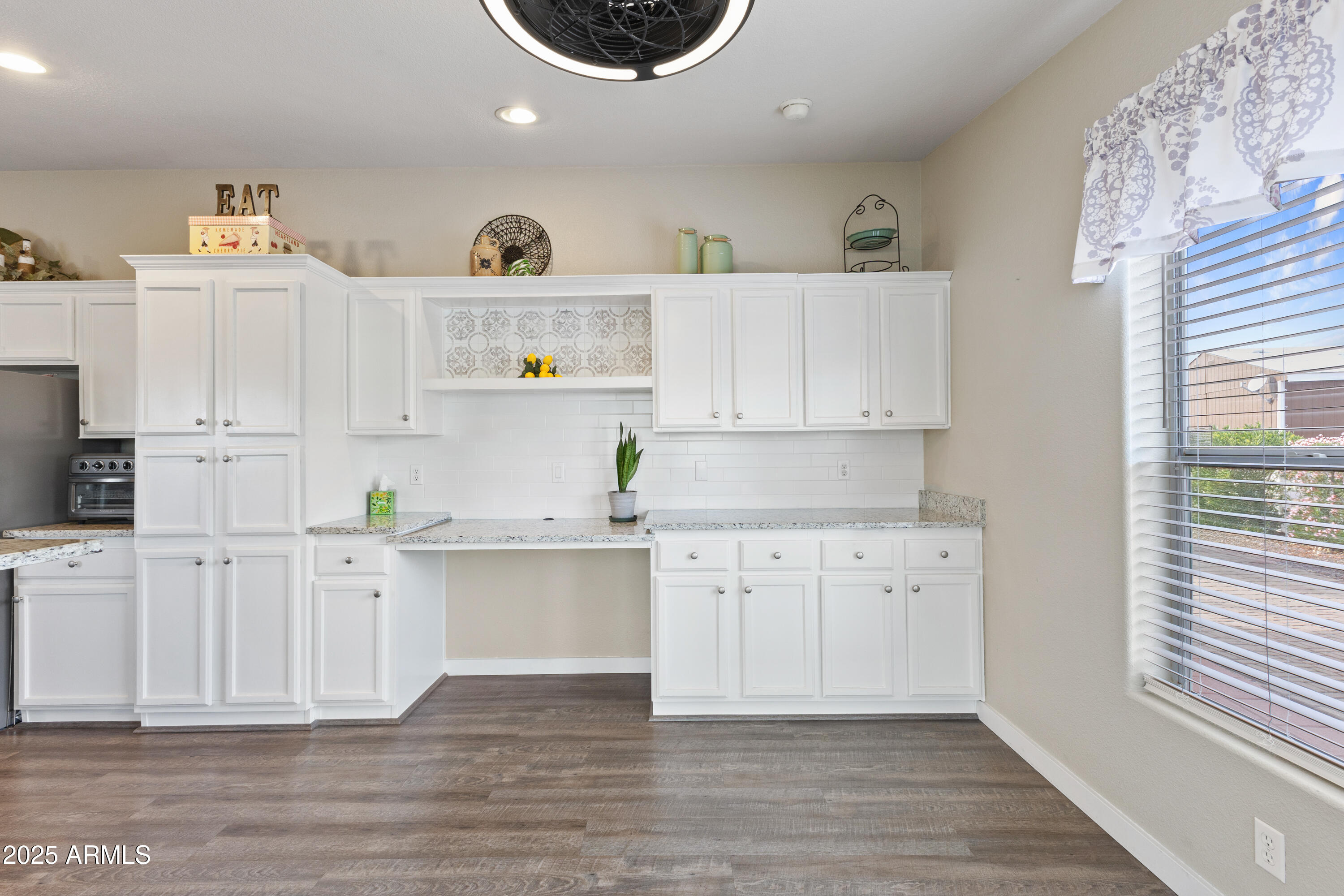 2000 South Apache Road, Unit 156 Buckeye, AZ 85326 - Photo 21 of 40 a view of white cabinets and wooden floor