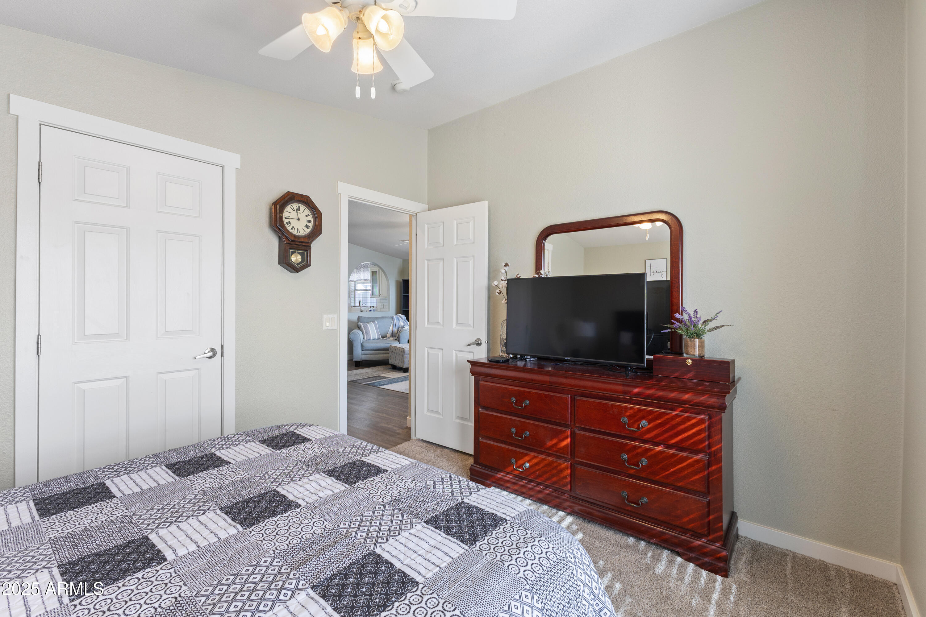 2000 South Apache Road, Unit 156 Buckeye, AZ 85326 - Photo 30 of 40 a living room with furniture and a flat screen tv