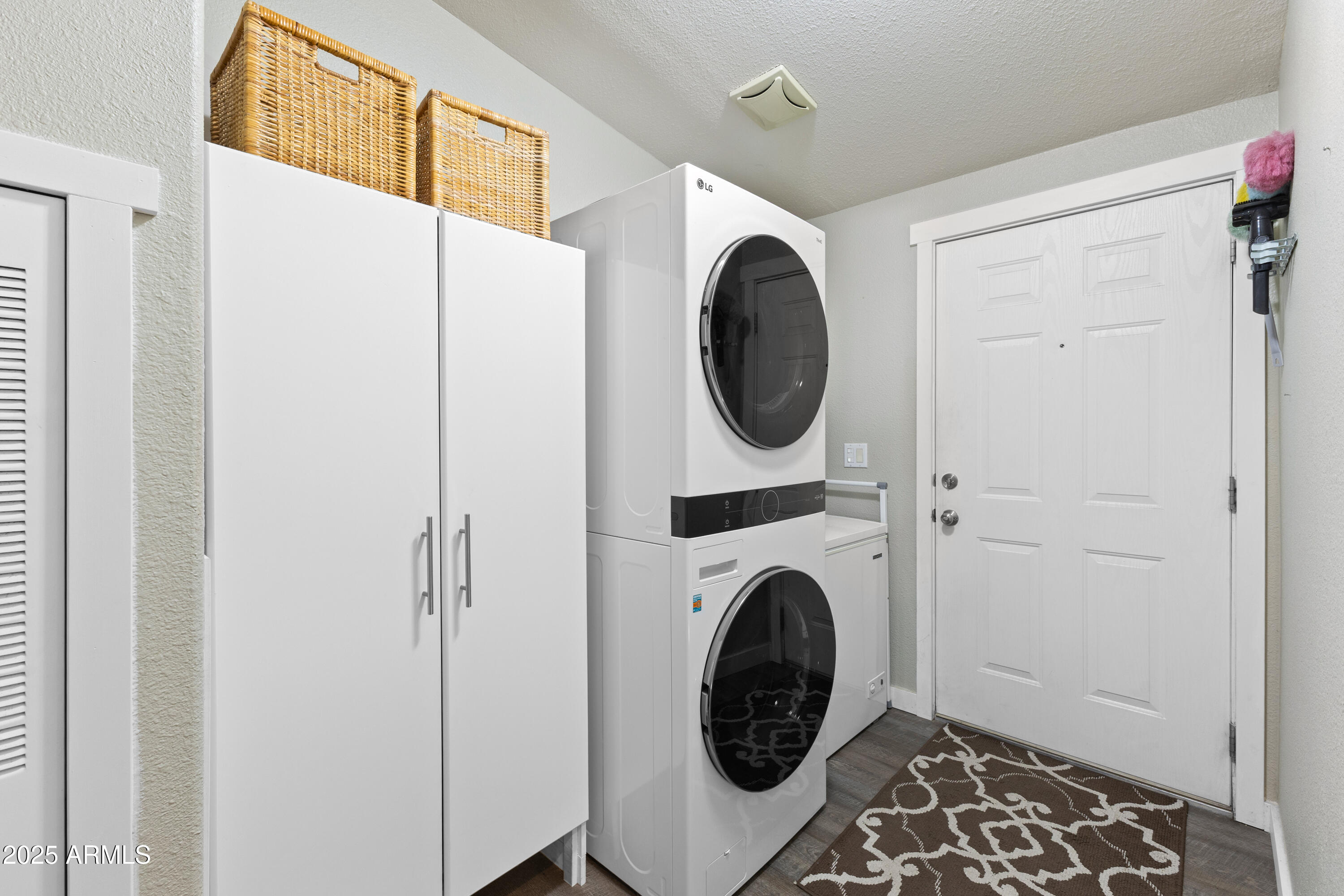 2000 South Apache Road, Unit 156 Buckeye, AZ 85326 - Photo 32 of 40 a view of entryway with washer and dryer
