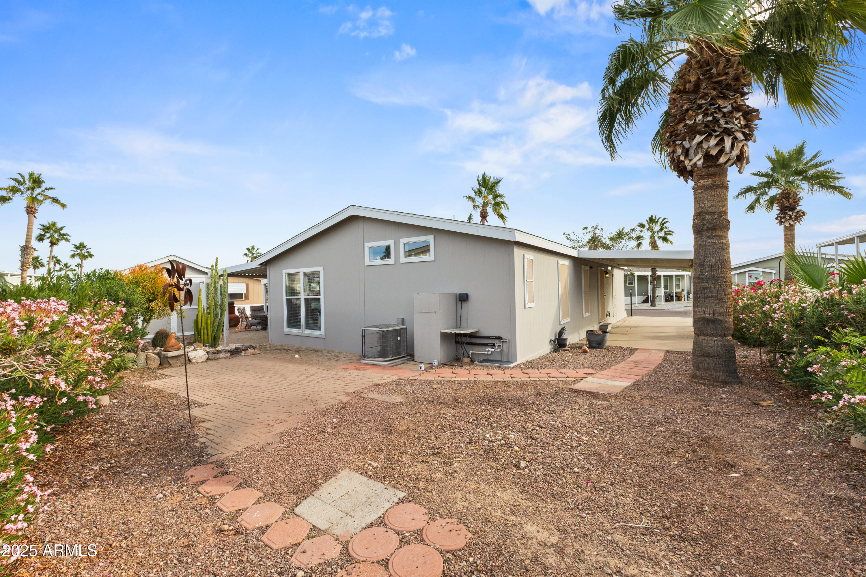 2000 South Apache Road, Unit 156 Buckeye, AZ 85326 - Photo 36 of 40 a view of a house with a patio