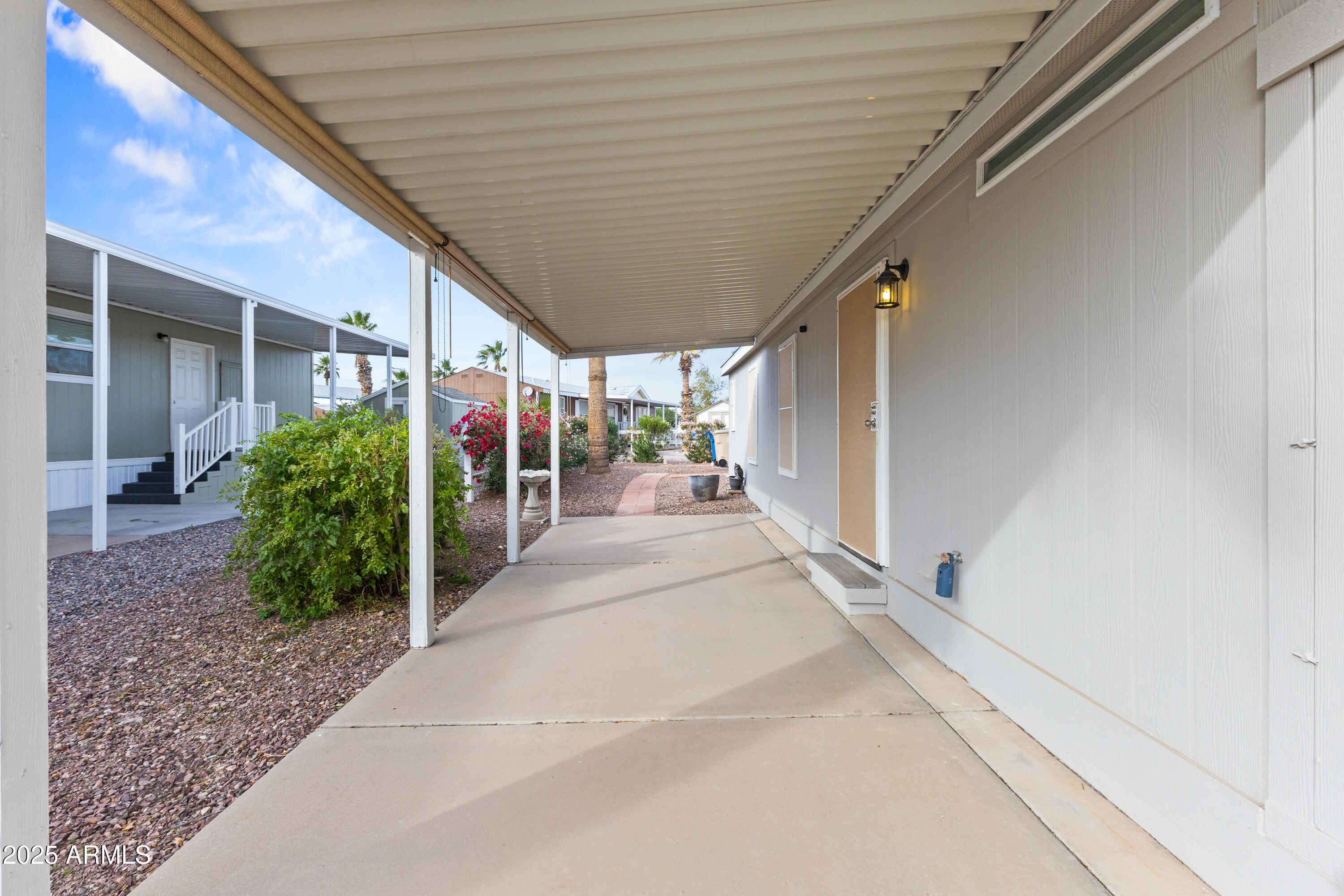 2000 South Apache Road, Unit 156 Buckeye, AZ 85326 - Photo 37 of 40 a view of a porch