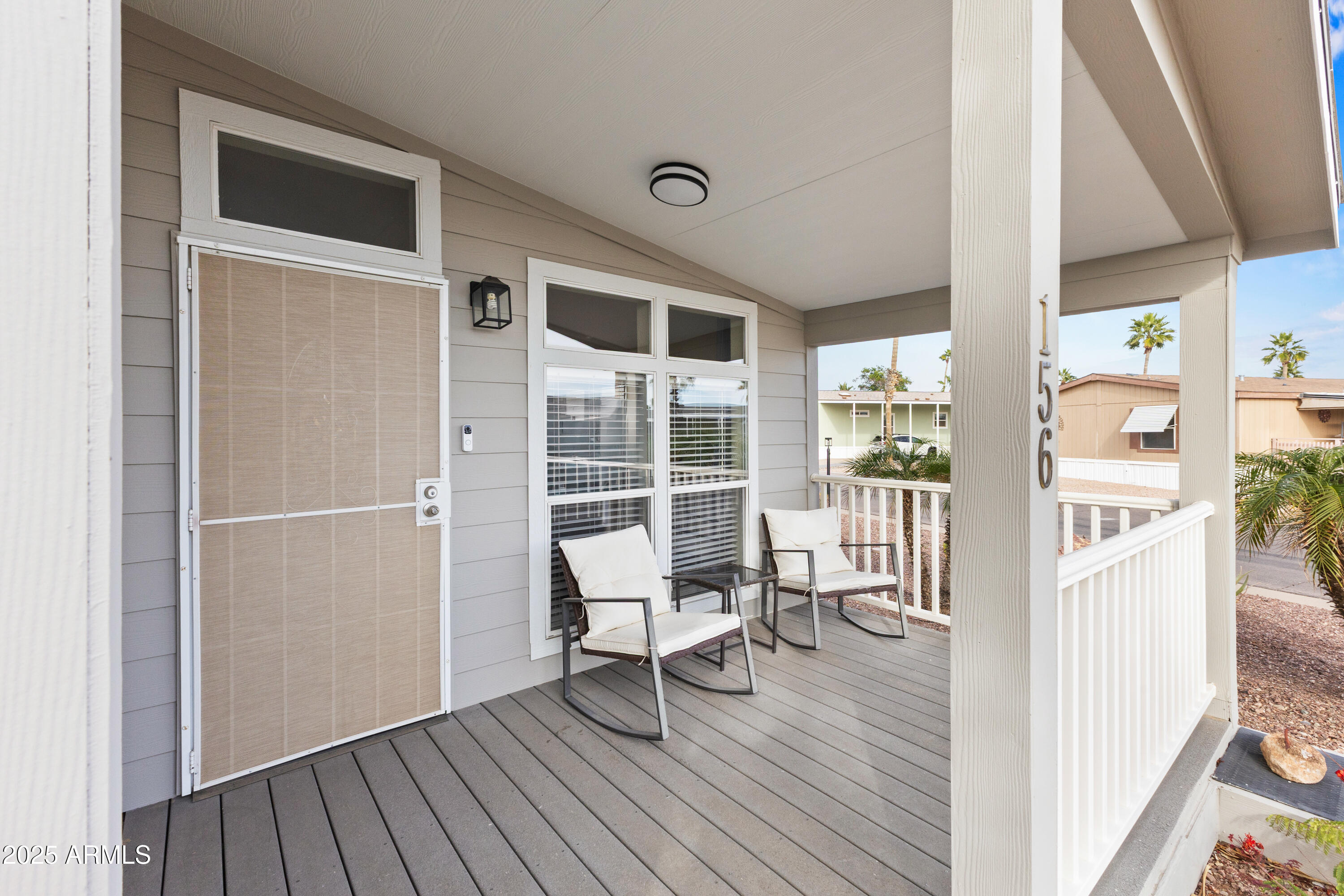 2000 South Apache Road, Unit 156 Buckeye, AZ 85326 - Photo 6 of 40 a view of wooden floor in a livingroom