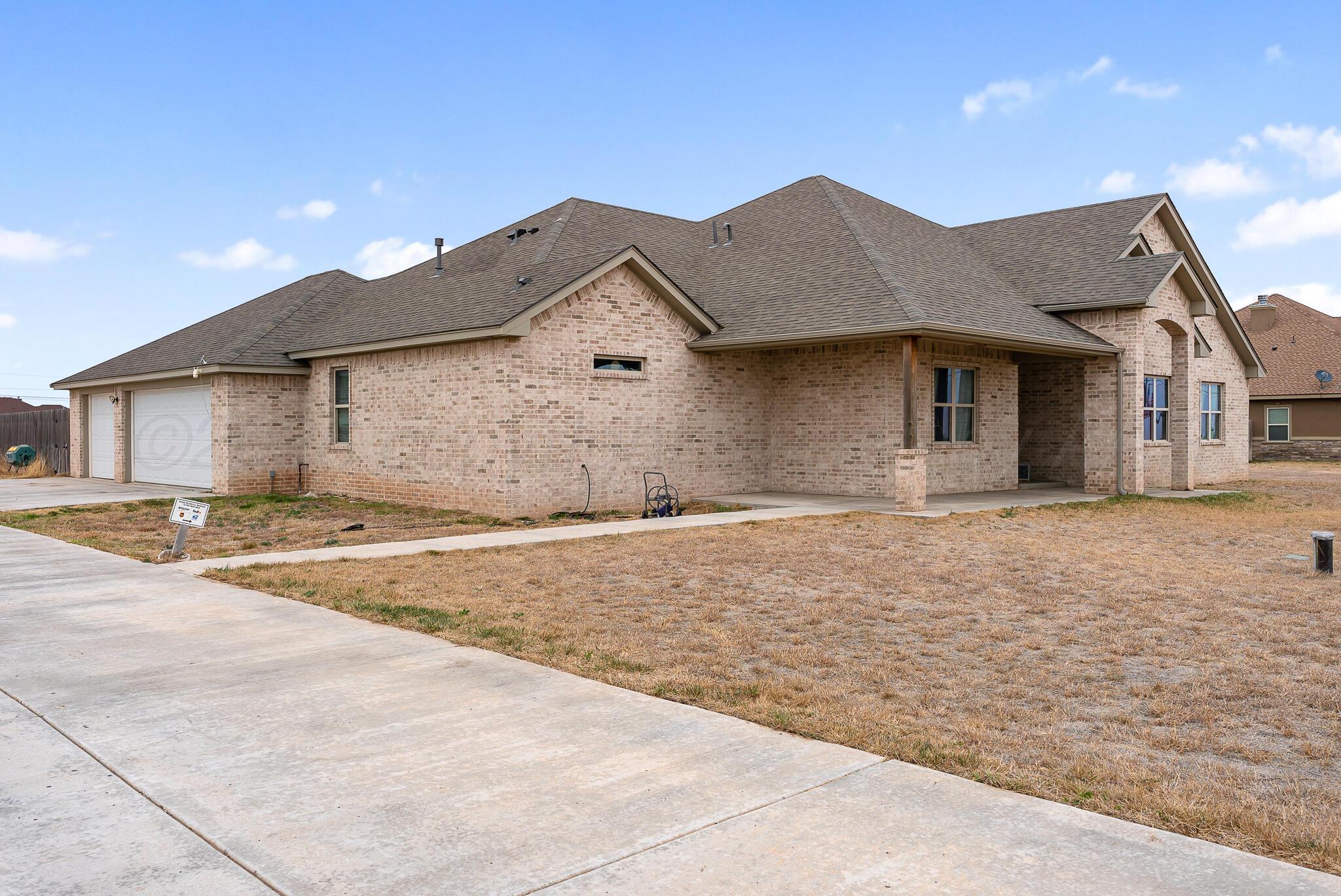 151 North Fm 2381 Amarillo, TX 79124 - Photo 3 of 36 a front view of a house with a yard