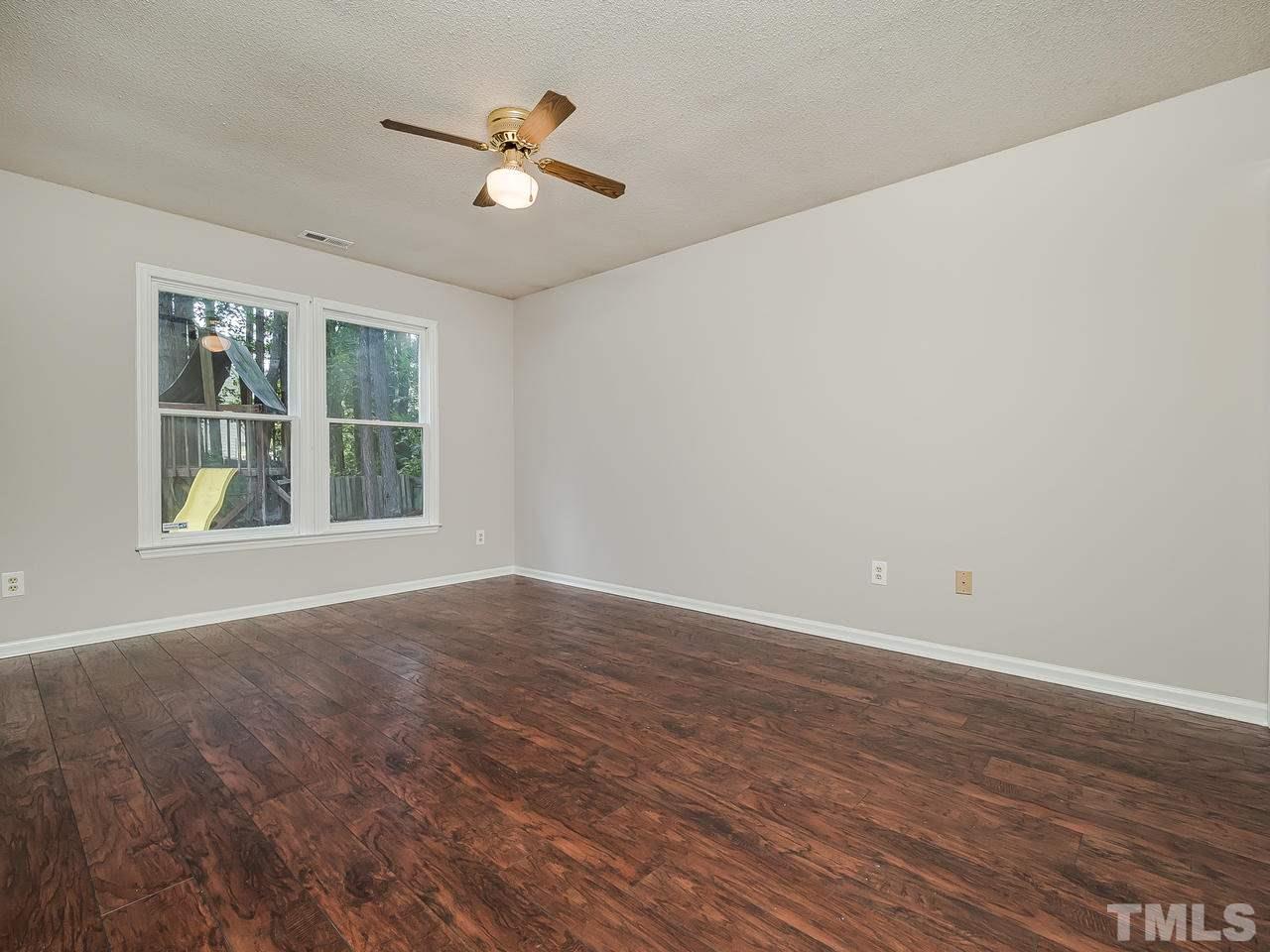 4609 Fox Road Raleigh, NC 27616 - Photo 4 of 7 Master bedroom is nice sized and the windows let in lots of natural light.