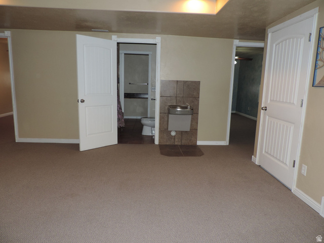 140 North 200 E Street Glenwood, UT 84730 - Photo 24 of 54 Unfurnished bedroom with carpet floors and ensuite bathroom