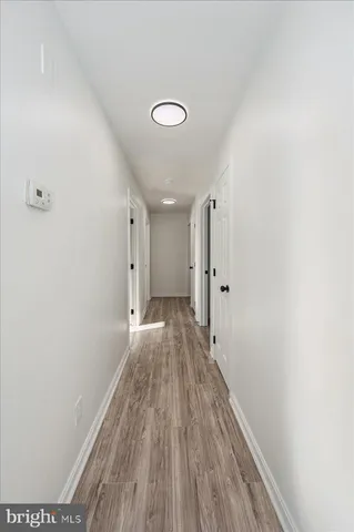 a view of small space with racks on the wall