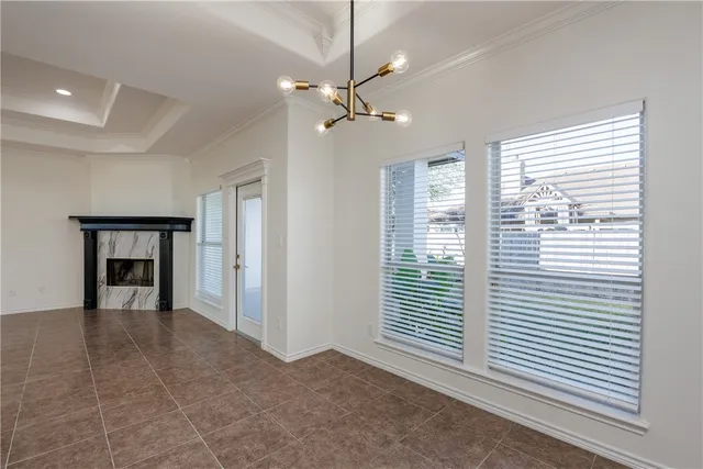 a view of a livingroom with a ceiling fan and window