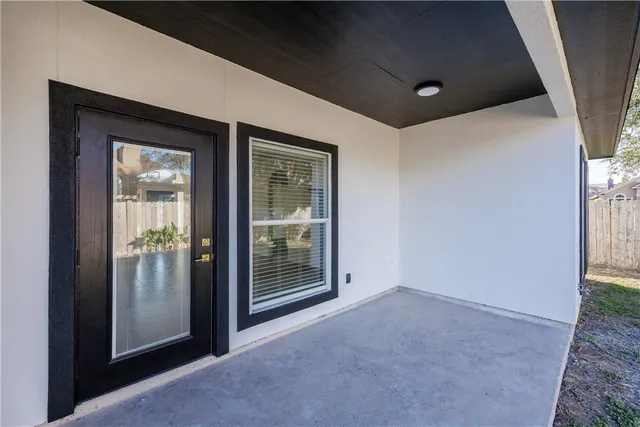 a living room with windows