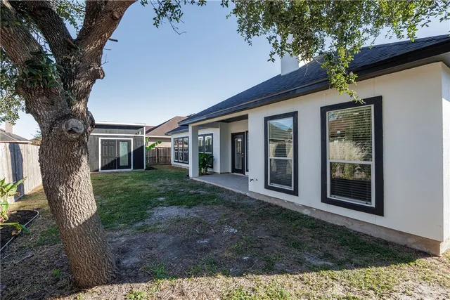 a view of a house with a garden