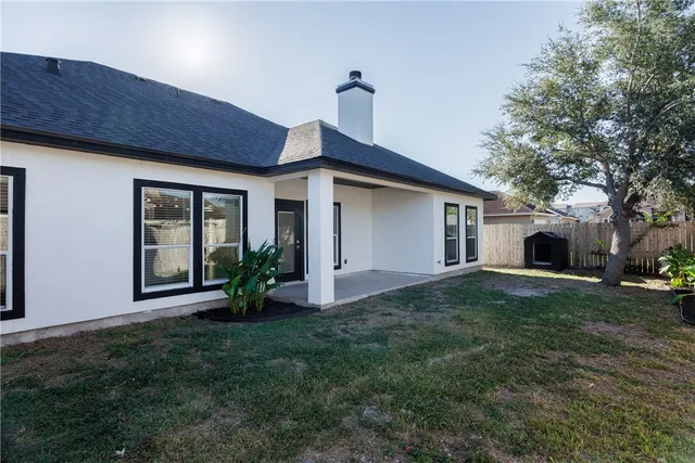 a house view with a garden space