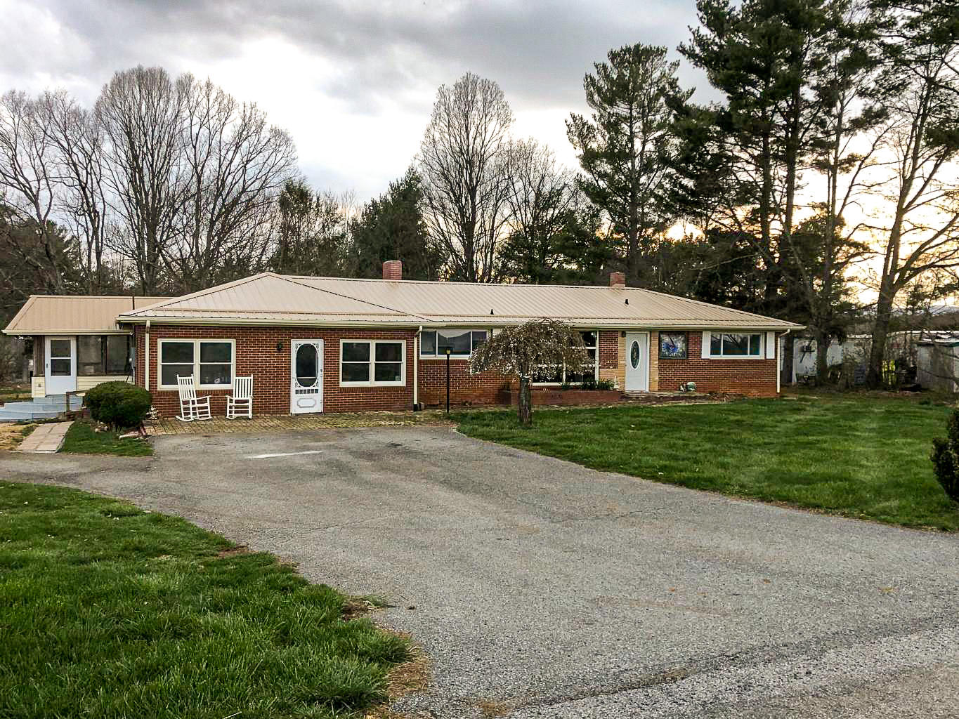 420 Long Level Road Southwest Floyd, VA 24091 - Photo 1 of 15 a front view of a house with a yard
