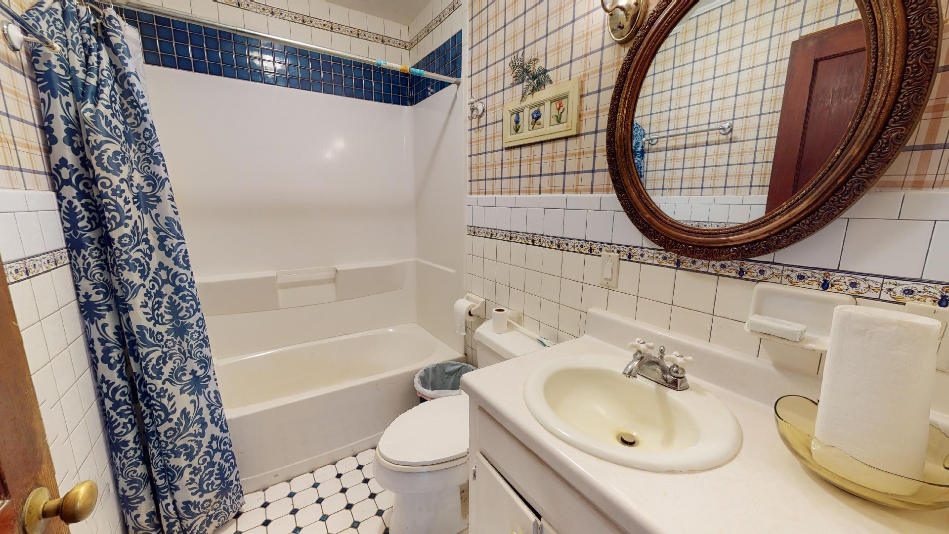 420 Long Level Road Southwest Floyd, VA 24091 - Photo 12 of 15 a bathroom with a sink toilet and a mirror