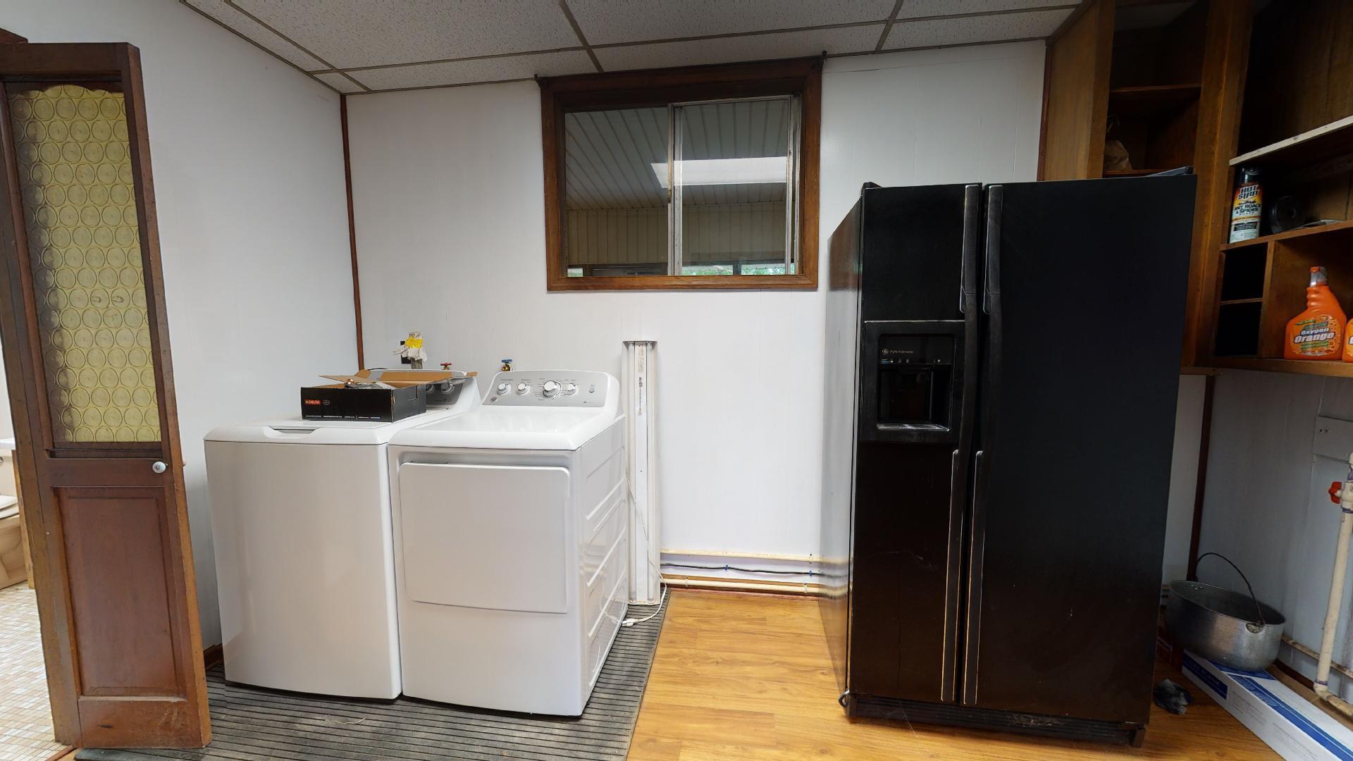 420 Long Level Road Southwest Floyd, VA 24091 - Photo 13 of 15 a utility room with wooden floor washer and dryer