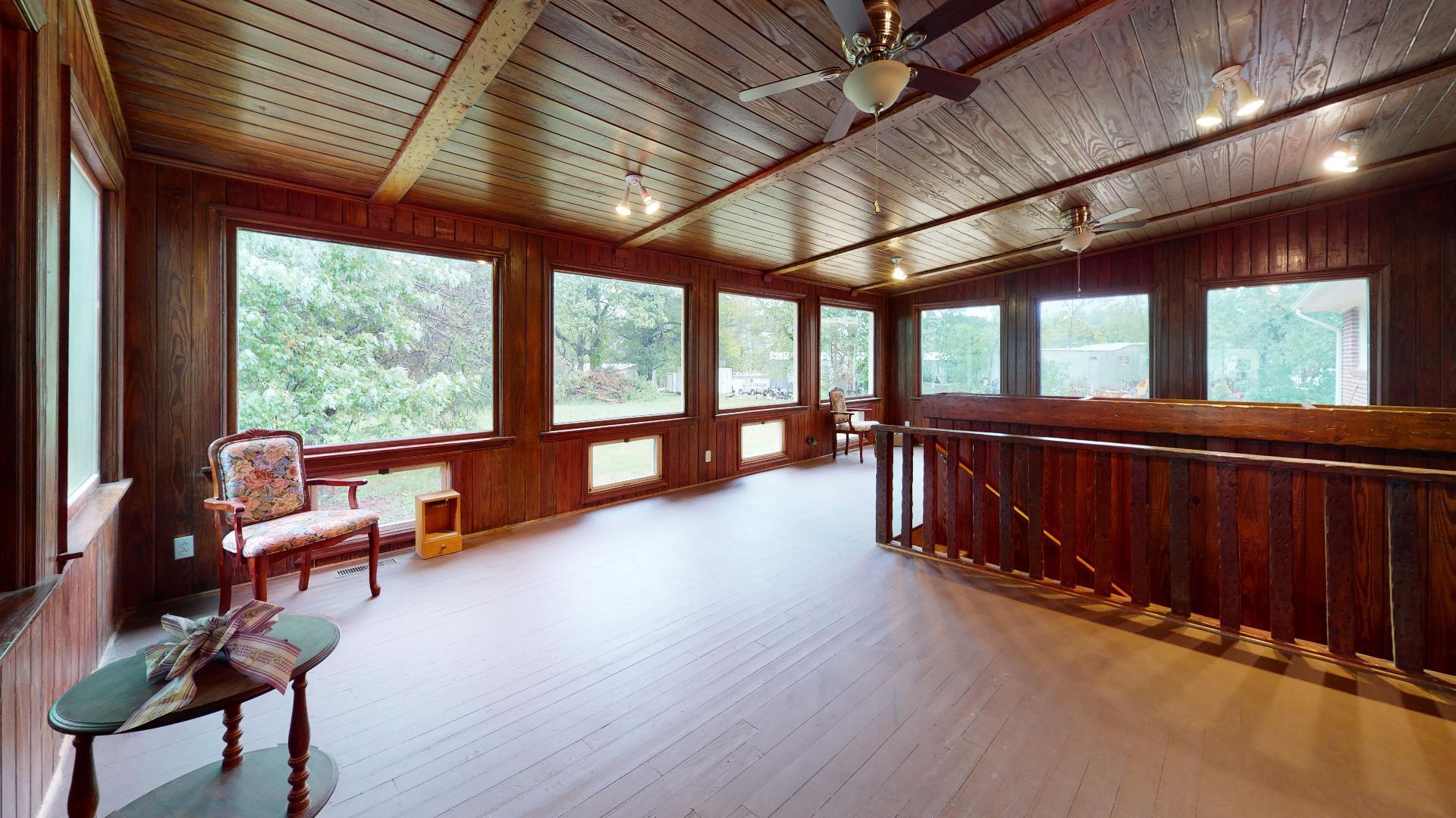 420 Long Level Road Southwest Floyd, VA 24091 - Photo 4 of 15 a view of a room with wooden floor and furniture