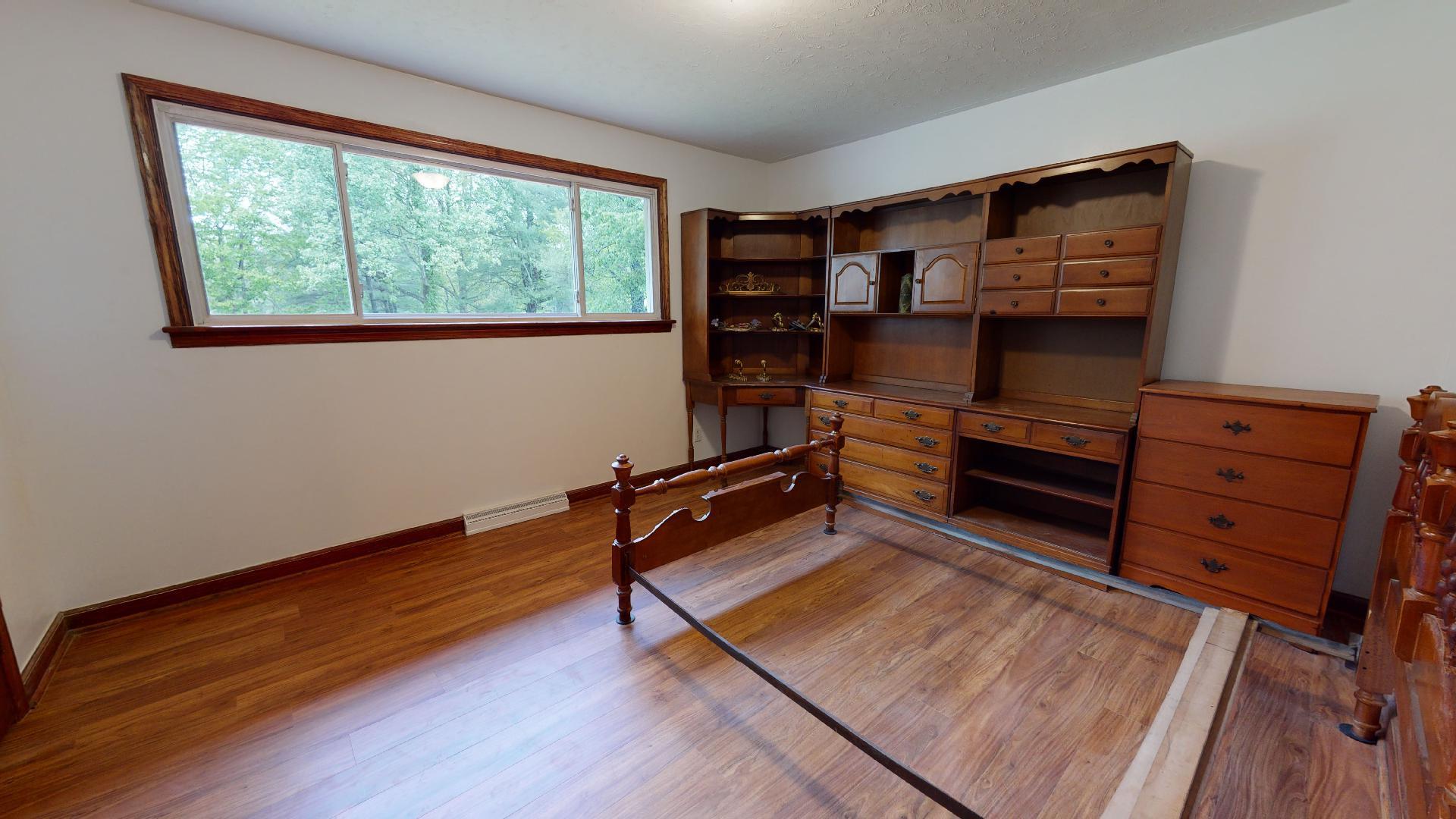420 Long Level Road Southwest Floyd, VA 24091 - Photo 9 of 15 a room with wooden floor and a window