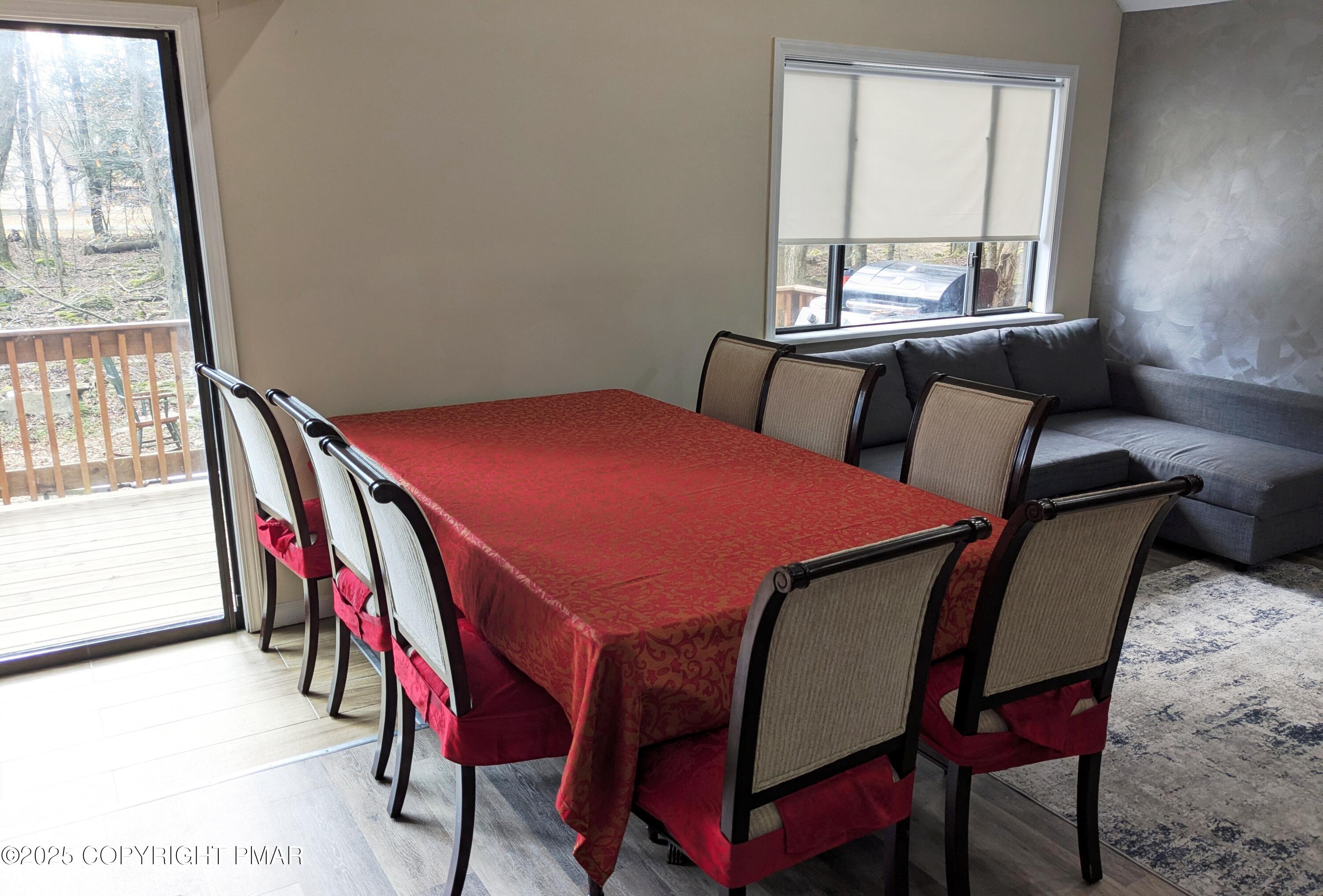 1027 Valley Road Newfoundland, PA 18445 - Photo 7 of 28 a view of a dining room with furniture and a window