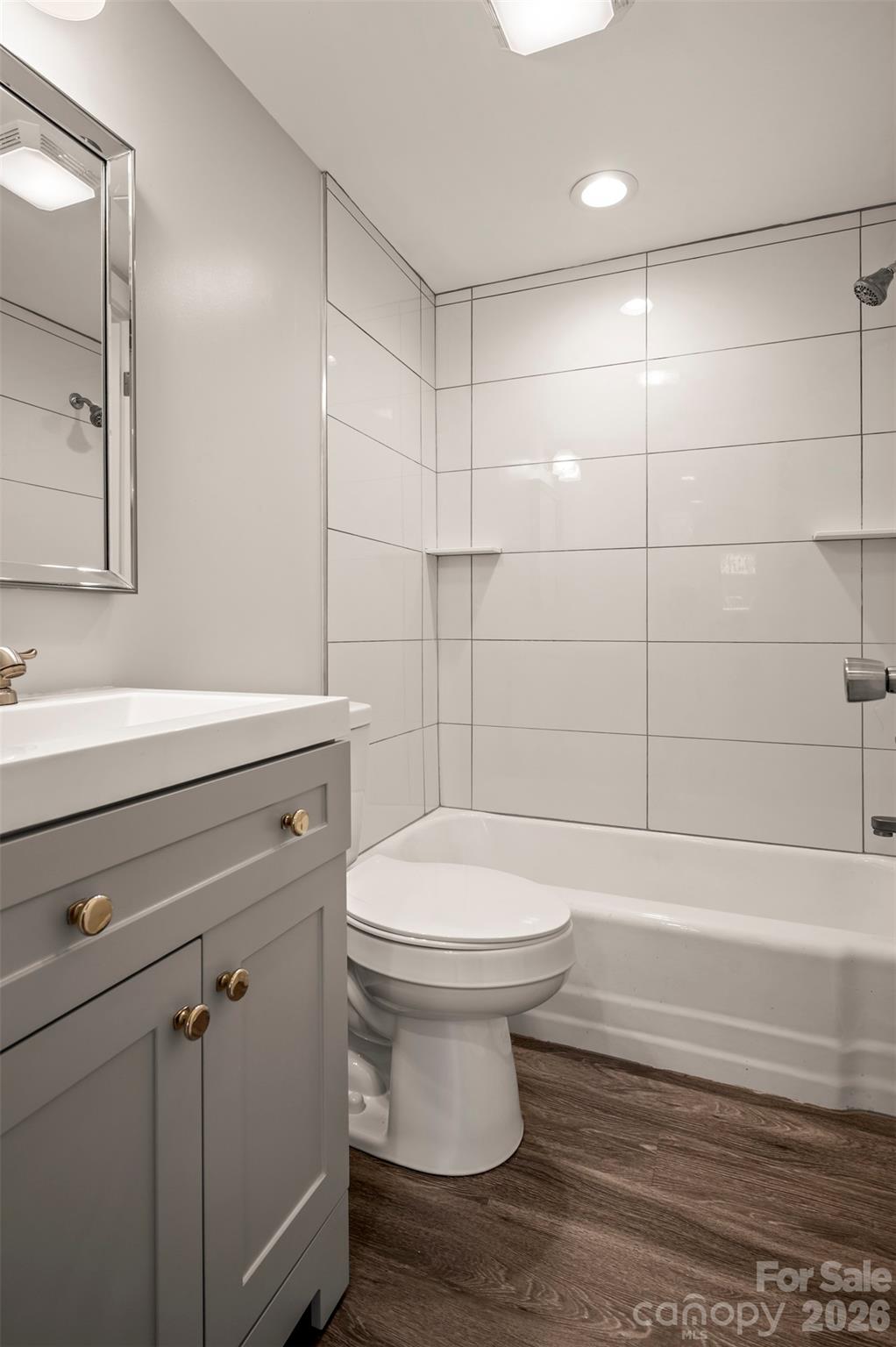220 Roberson Road Forest City, NC 28043 - Photo 12 of 35 a bathroom with a sink a toilet and shower