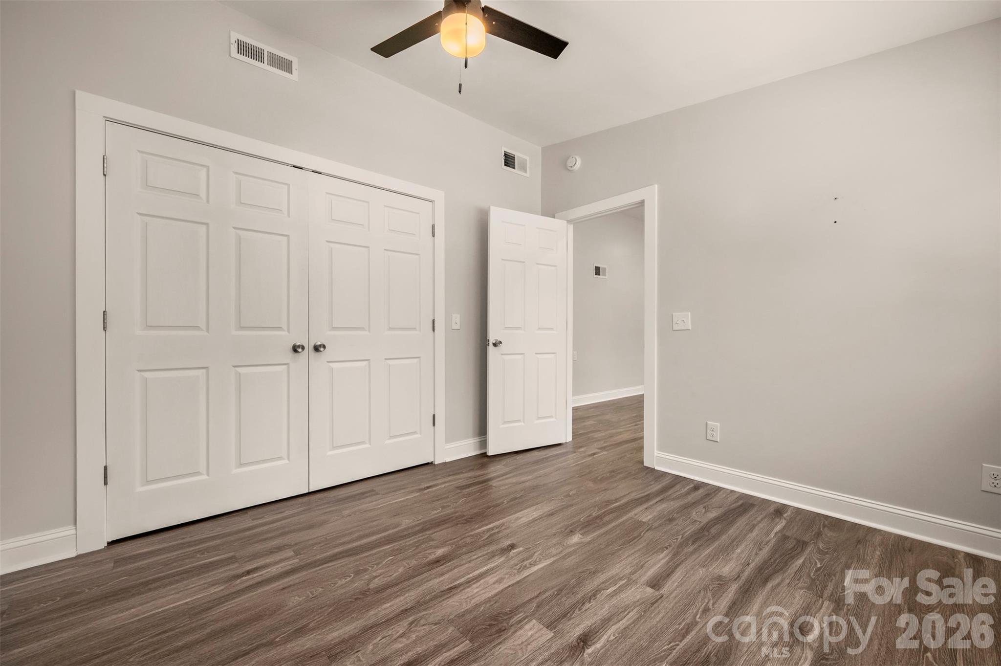 220 Roberson Road Forest City, NC 28043 - Photo 19 of 35 an empty room with wooden floor