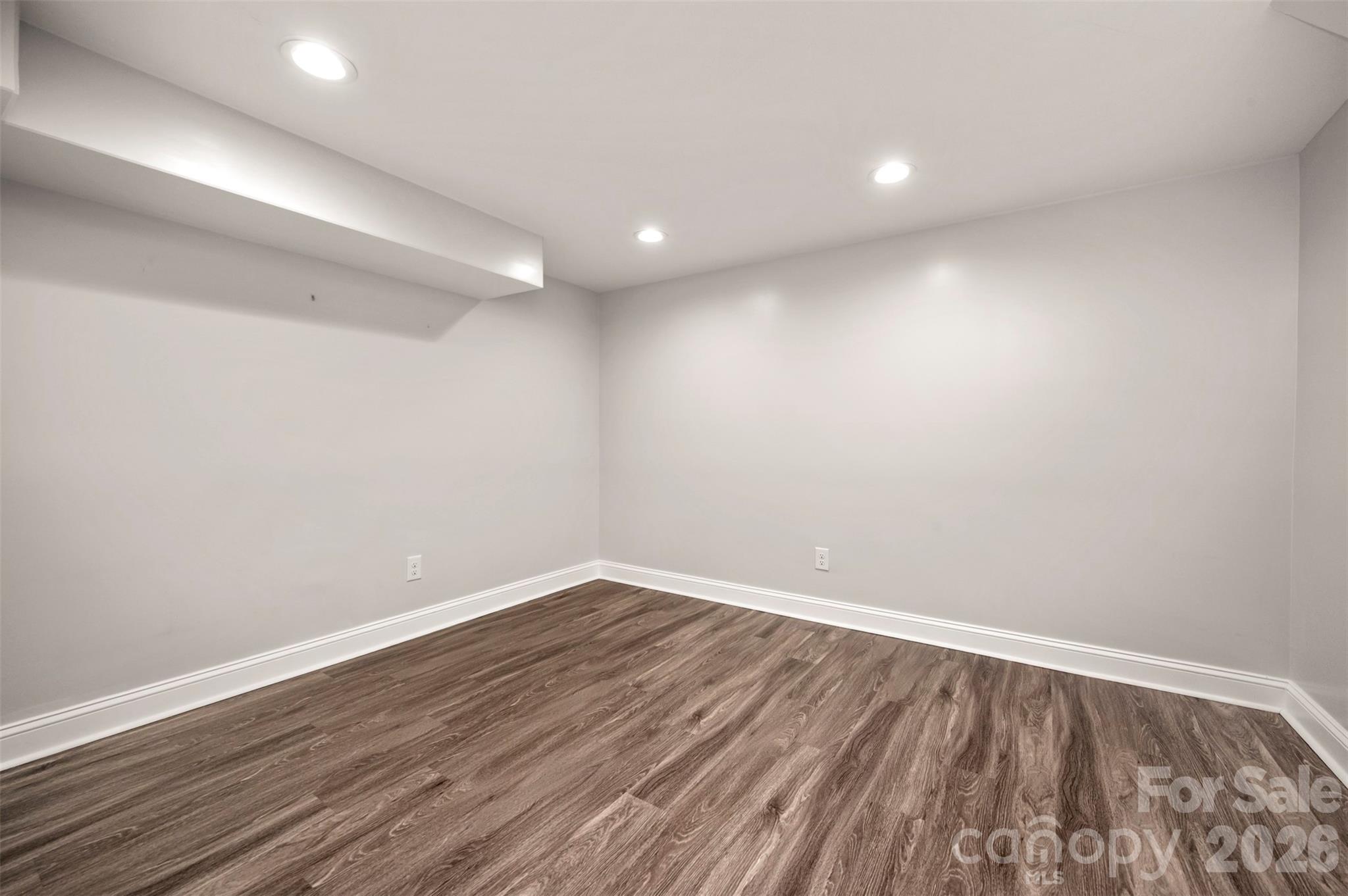 220 Roberson Road Forest City, NC 28043 - Photo 24 of 35 a view of room with wooden floor and fan