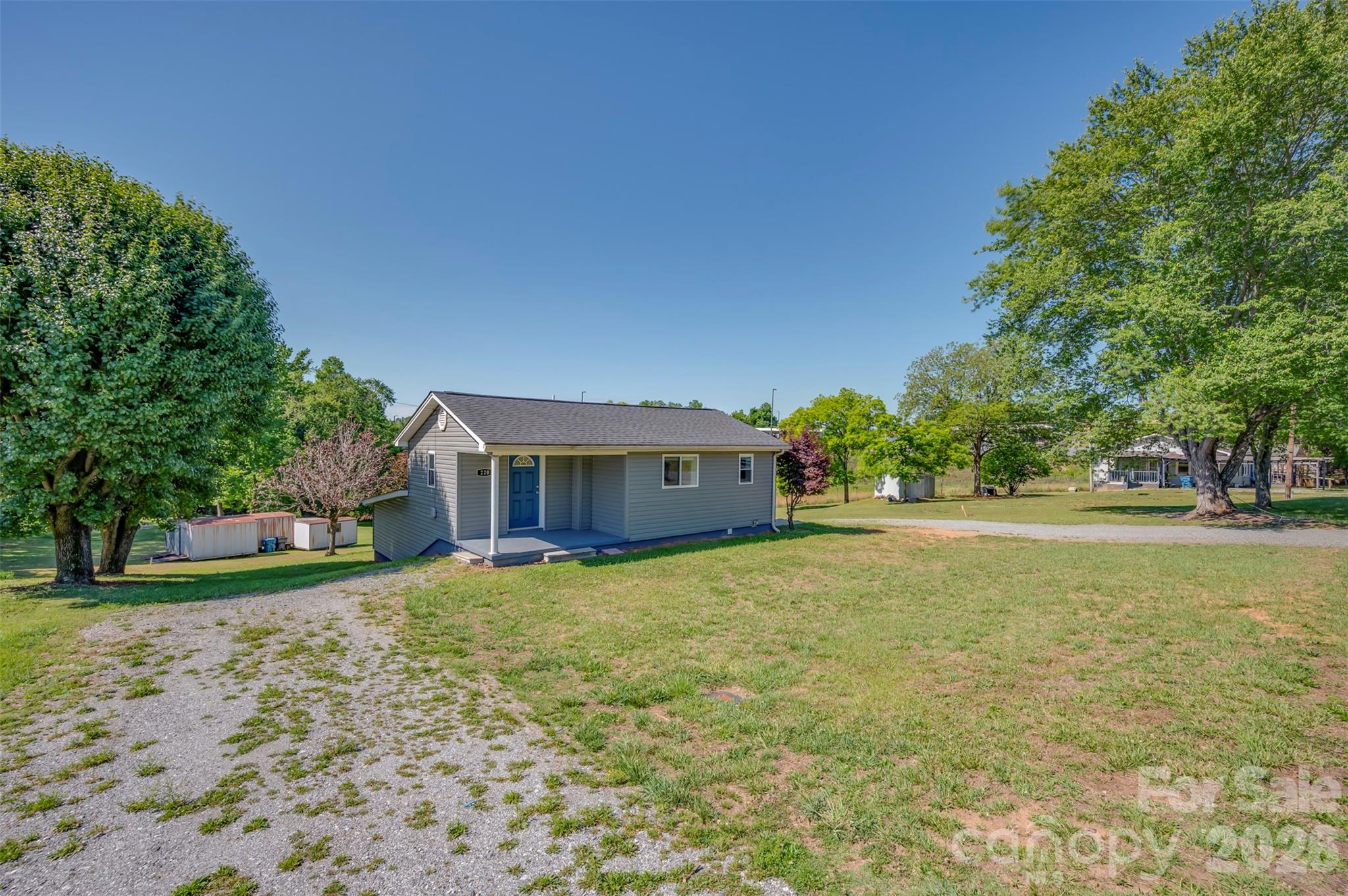 220 Roberson Road Forest City, NC 28043 - Photo 26 of 35 a view of a house with a yard