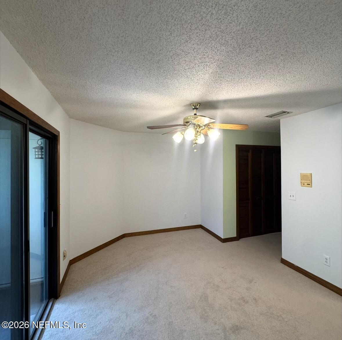10800 Old St Augustine Road, Unit 204 Jacksonville, FL 32257 - Photo 25 of 31 Primary Bedroom with balcony