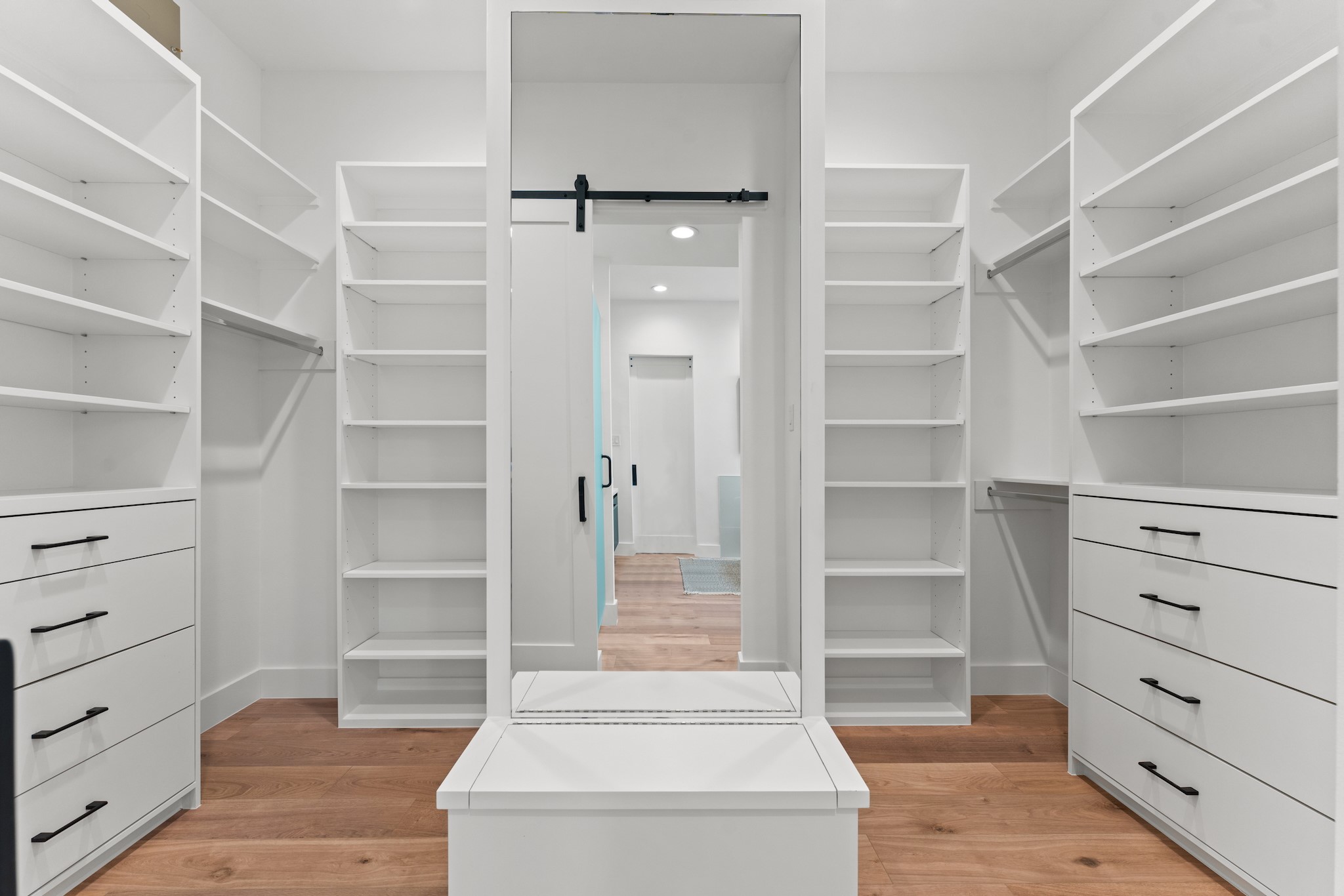 6711 Housman Houston, TX 77055 - Photo 26 of 49 a view of walk in closet with empty racks
