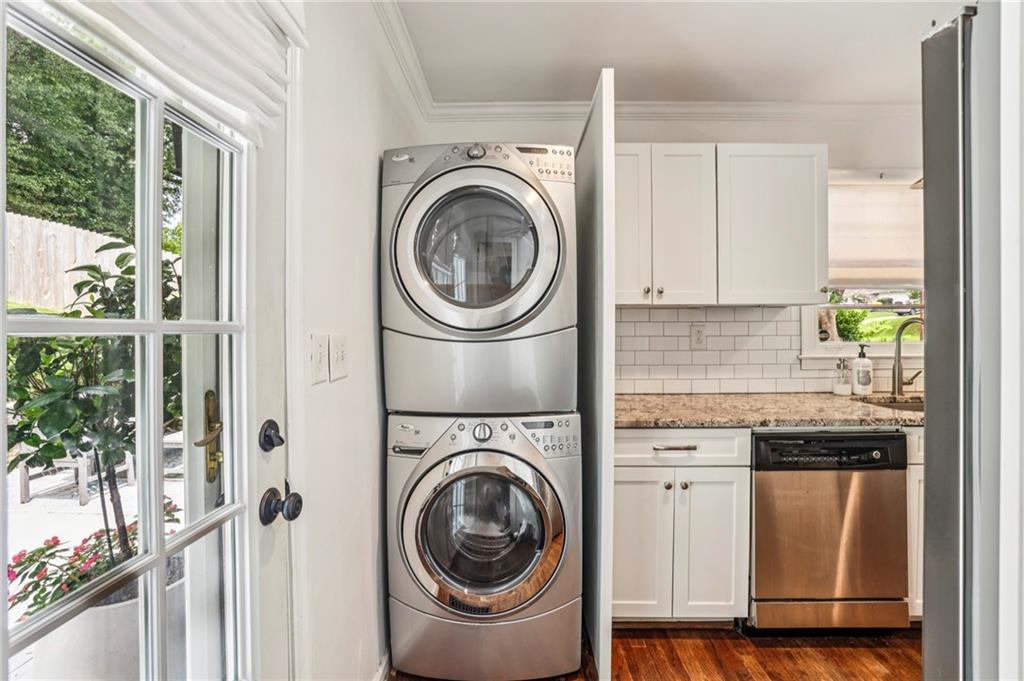 2226 Fairway Circle Northeast Brookhaven, GA 30319 - Photo 13 of 26 a view of a kitchen with washer and dryer
