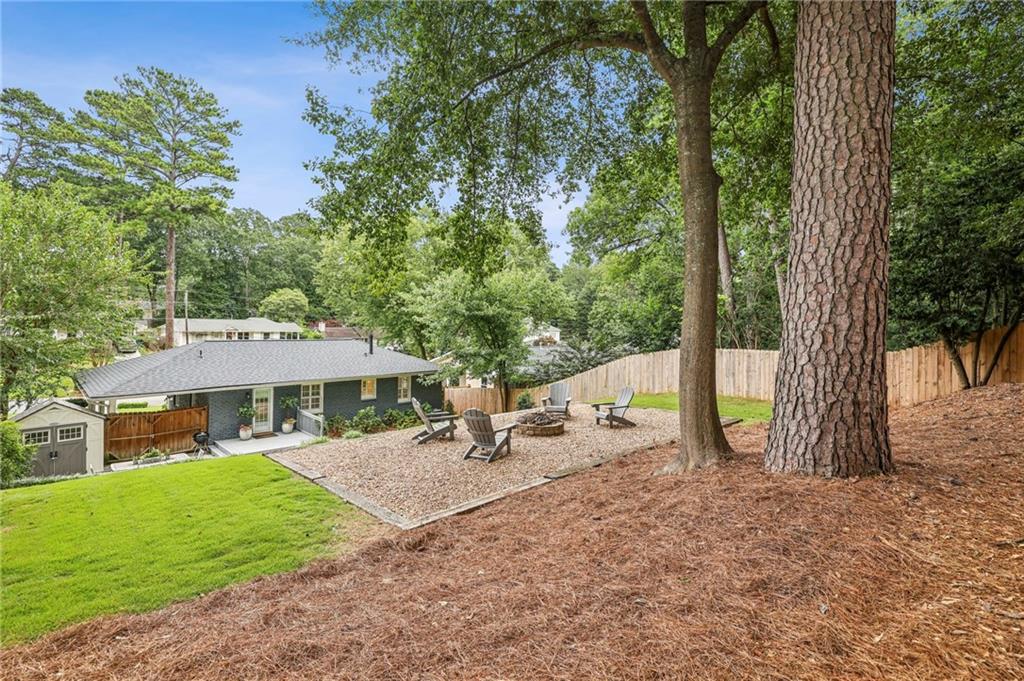 2226 Fairway Circle Northeast Brookhaven, GA 30319 - Photo 24 of 26 a view of a house with backyard and a tree