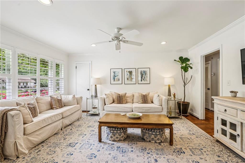2226 Fairway Circle Northeast Brookhaven, GA 30319 - Photo 5 of 26 a living room with furniture a table and a large window