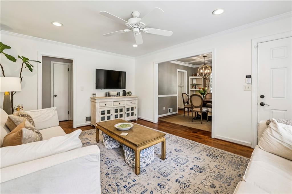 2226 Fairway Circle Northeast Brookhaven, GA 30319 - Photo 7 of 26 a living room with furniture and a flat screen tv